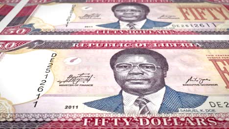 banknotes of fifty dollars of the bank of liberia rolling on screen, coins of the world, cash money, loop