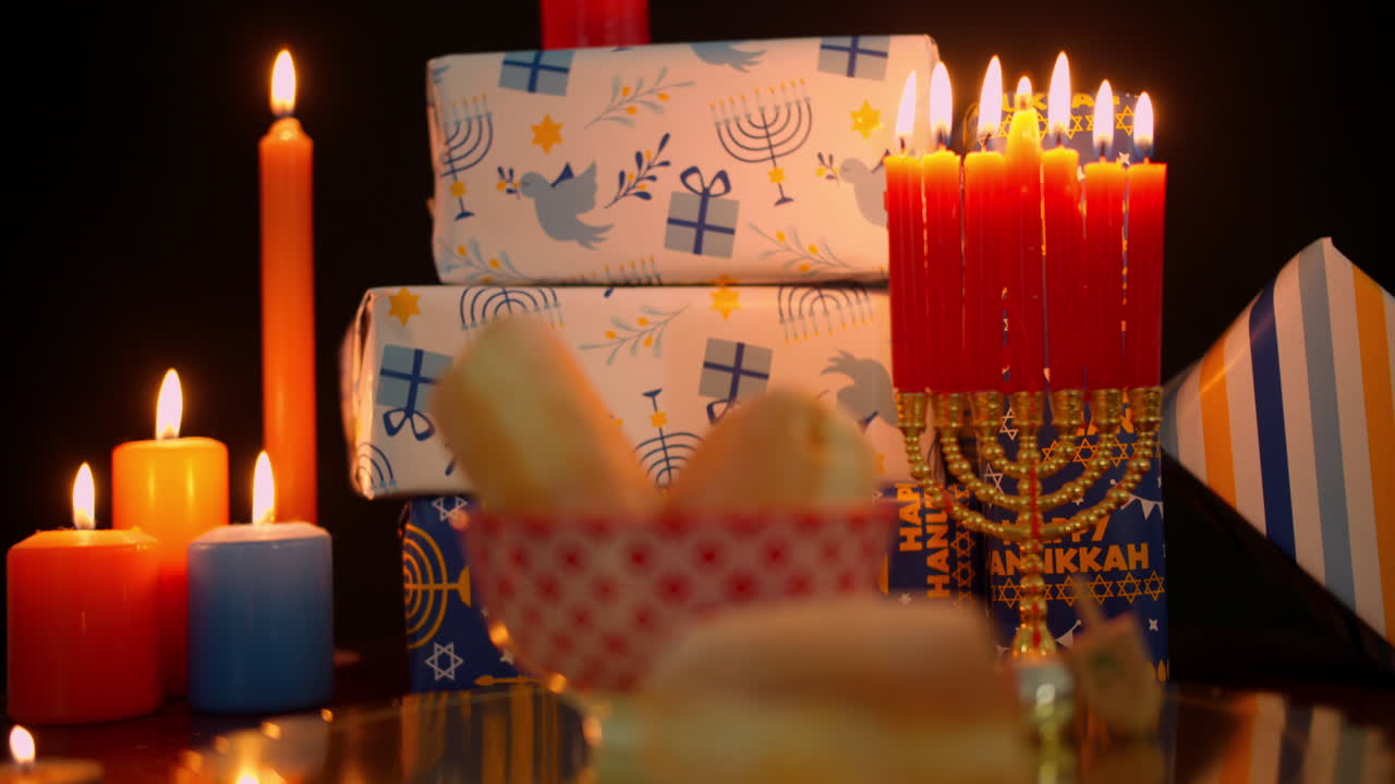 Hanukkah Celebration with Lit Menorah, Gifts, and Sufganiyot
