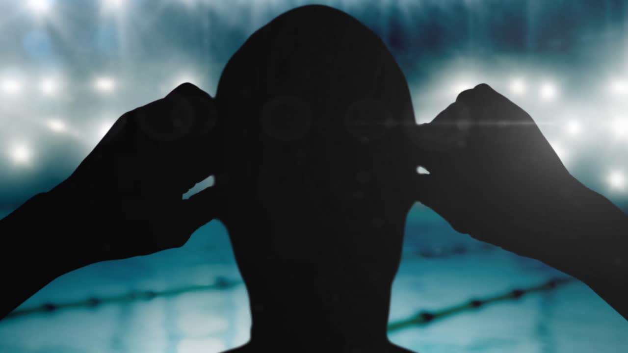 스포트라이트와 수영장 위의 수영 선수의 실루 ⁇ 의 애니메이션