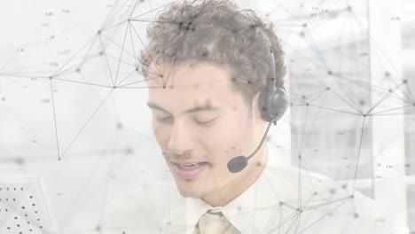 Animation-of-network-of-connections-over-businessman-with-headset-in-office