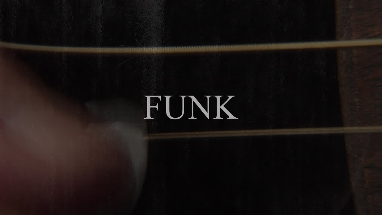 animación de texto funk sobre una persona tocando la guitarra