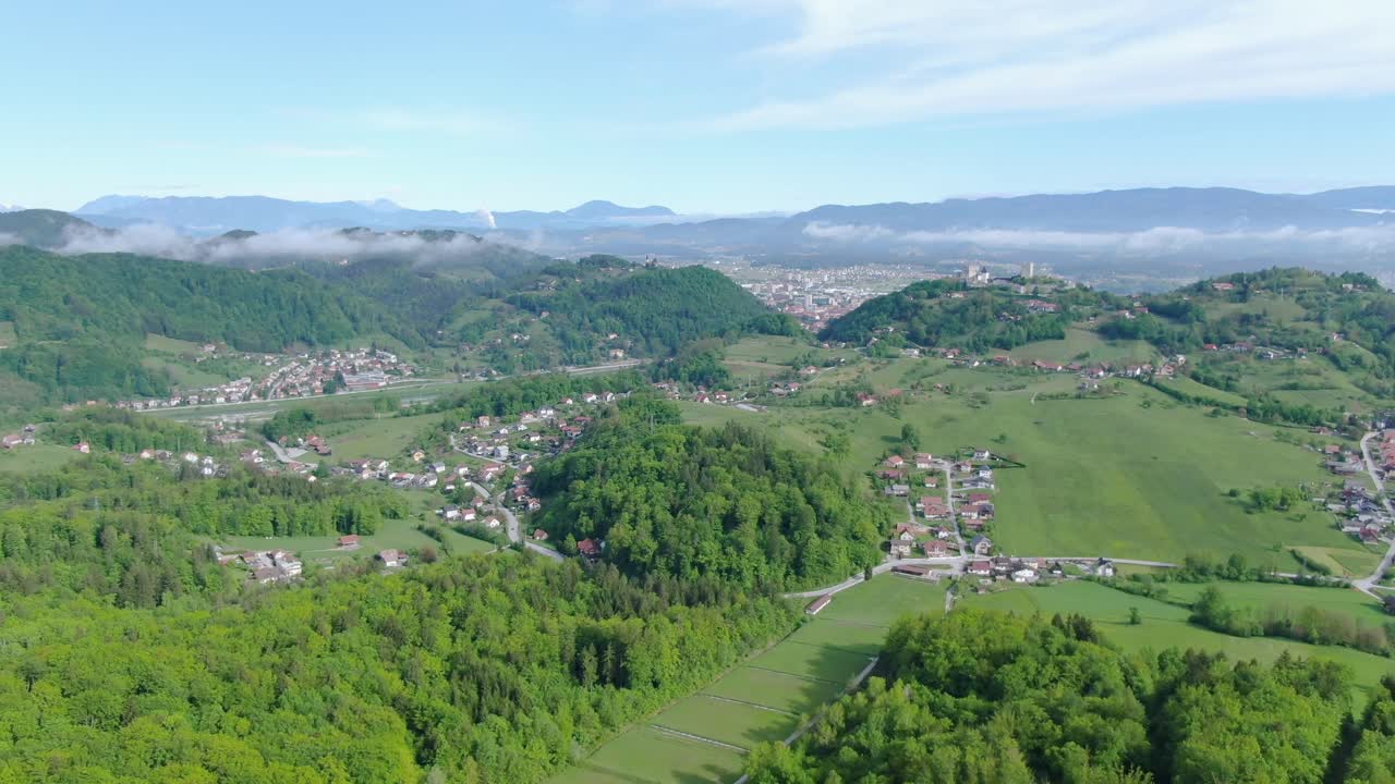 Aerial circling view of valley and villages in Kocevje, Slovenia
