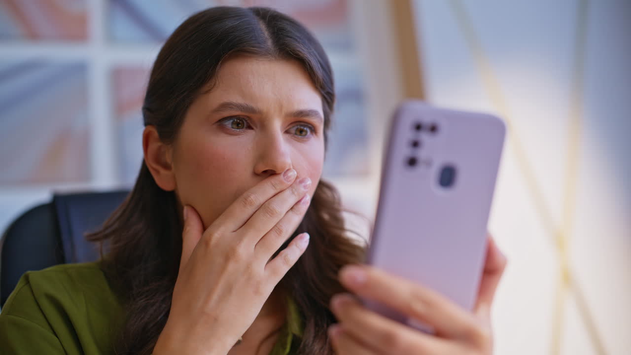 Surprised Woman with Phone