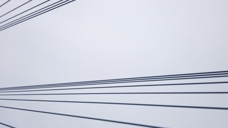 looking up at cables and towers of my thuan bridge a large suspension bridge or cable stayed bridge in the mekong delta in vietnam