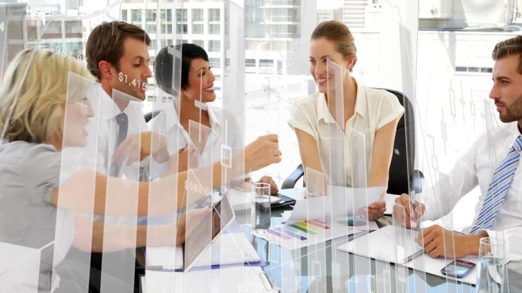 Business people discussing in an office and graphs 4k