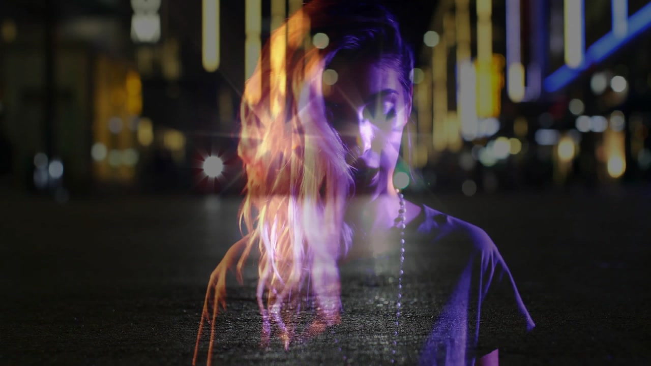 Musician starting chord on keyboard pausing softly resuming for night music show with neon flares