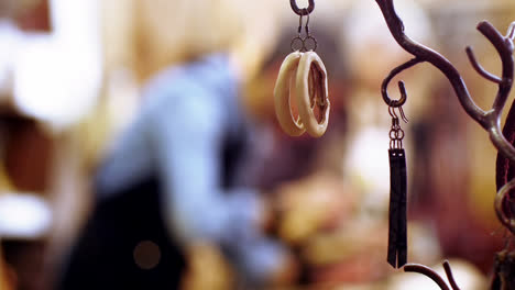 various leather accessories hanging on hook