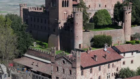 rising reveal of gabiano castle and the surrounding countryside, piedmont, italy