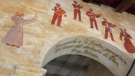 Murals-line-the-adobe-walls-of-a-California-Mission-1