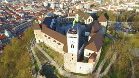 Point-of-drone-view-Ljubljana-castle,-one-of-the-most-important-landmarks-of-the-city,-Slovenia