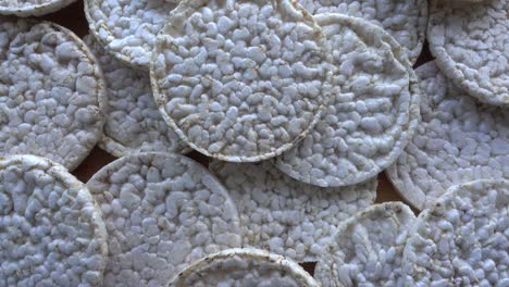 close up view fresh made rotating rice cakes