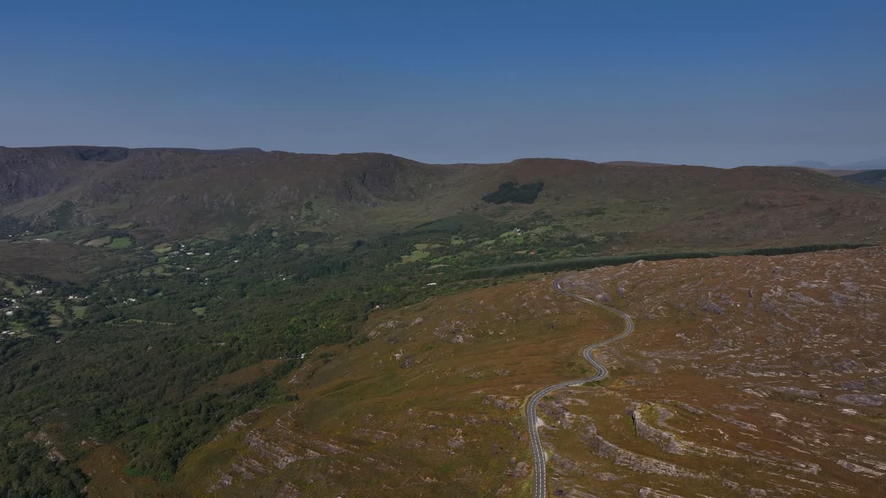 Aerial View of a Winding Mountain Road in Ireland