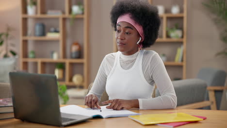 young woman studying online at home