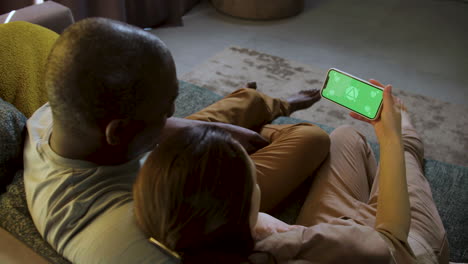 couple on sofa at home