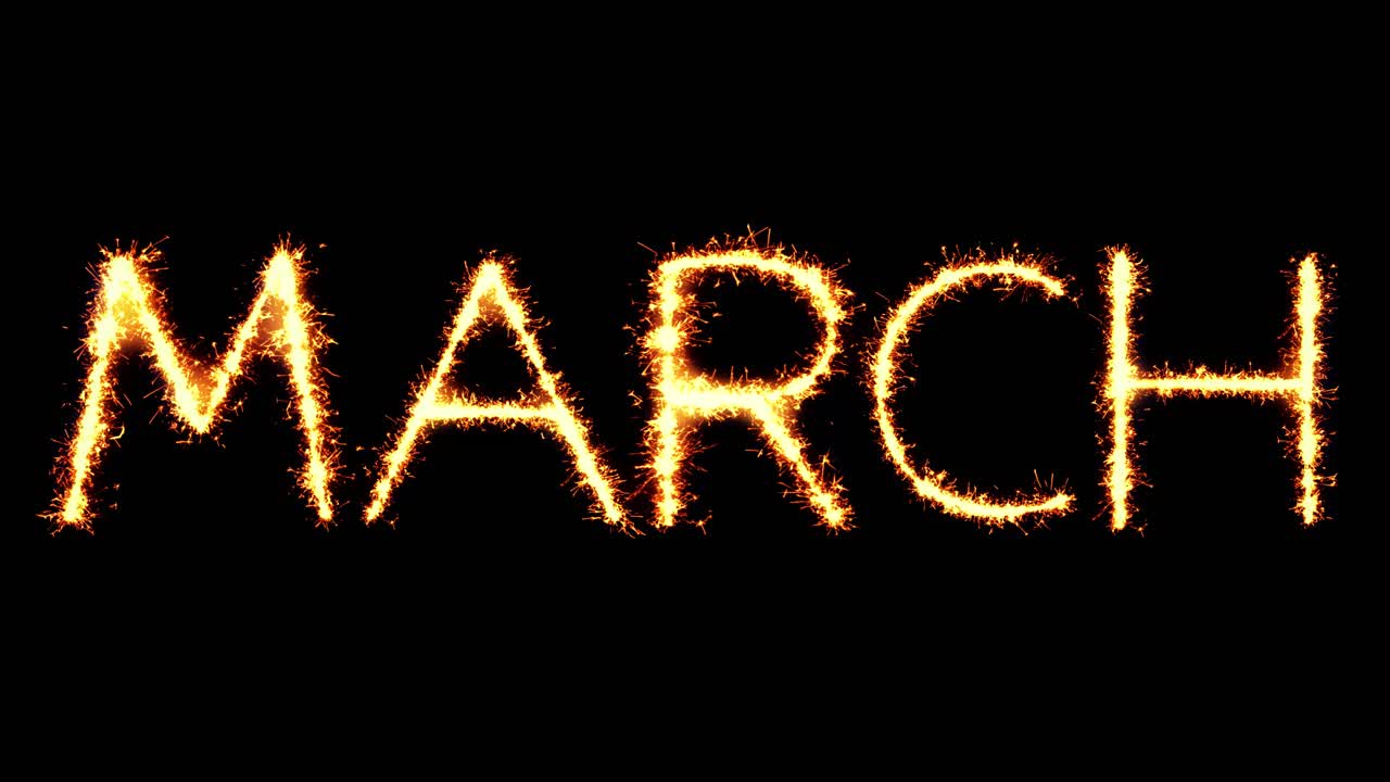 March text sparkler writing with glitter sparks particles firework on black 4k loop background