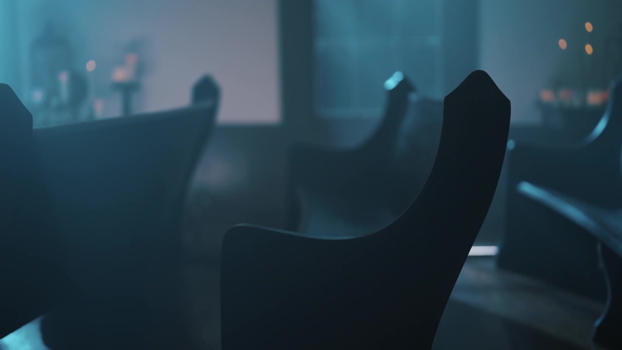 Dark Silhouettes of Empty Church Pews in a Mysterious Setting
