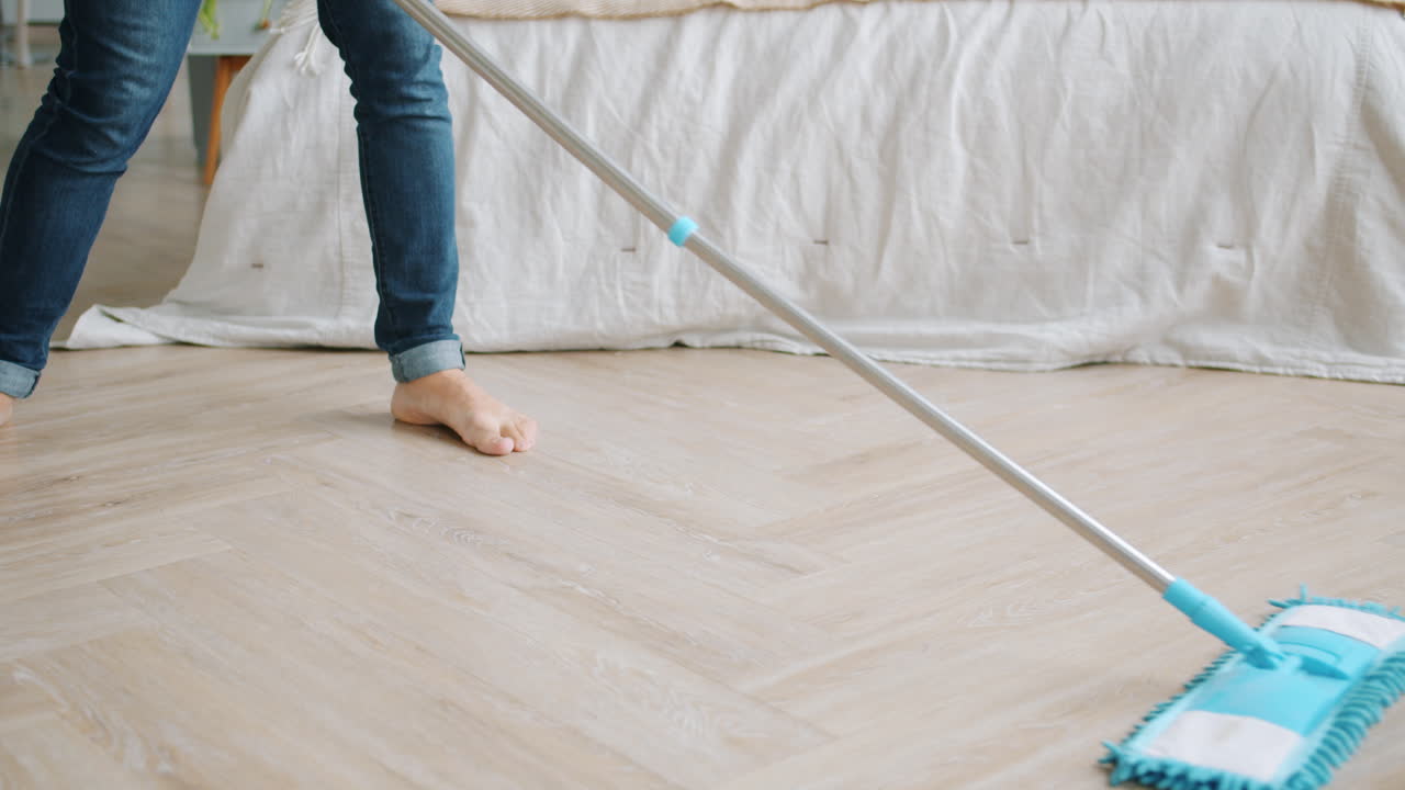 Cleaning a Bedroom Floor
