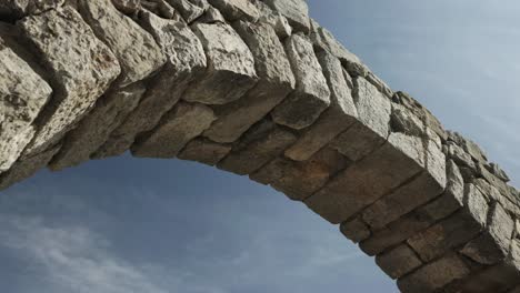 Romanesque-arch-of-cathedral-in-Girona-in-summer-sun-in-Spain