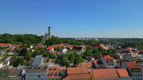 Panoramic-Aerial-View-Of-The-City-And-Parish-Church-Of-Mistelbach,-Lower-Austria