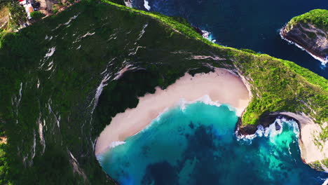 Breathtaking-T-rex-beach-with-blue-lagoon-and-green-foliage,-Indonesia