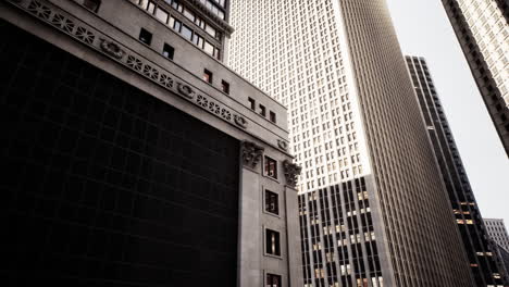 tall buildings reach towards the sky in a bustling urban environment