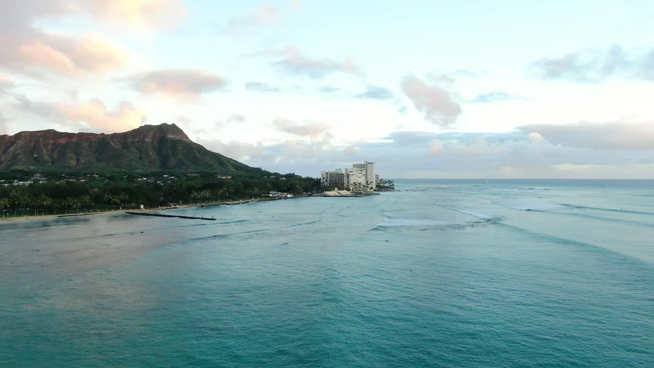 Beautiful Waikiki and Diamond Head Sunset with peaceful waves rolling in