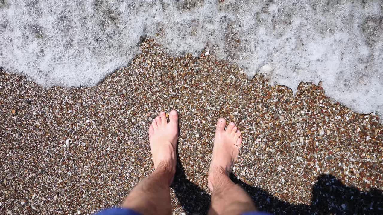 Feet on a Pebble Beach