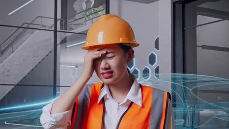 trabajador de la construcción estresado en una oficina moderna