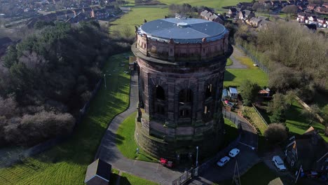 aerial view national trust norton water tower landmark architecture runcorn england countryside scene descending tilt up