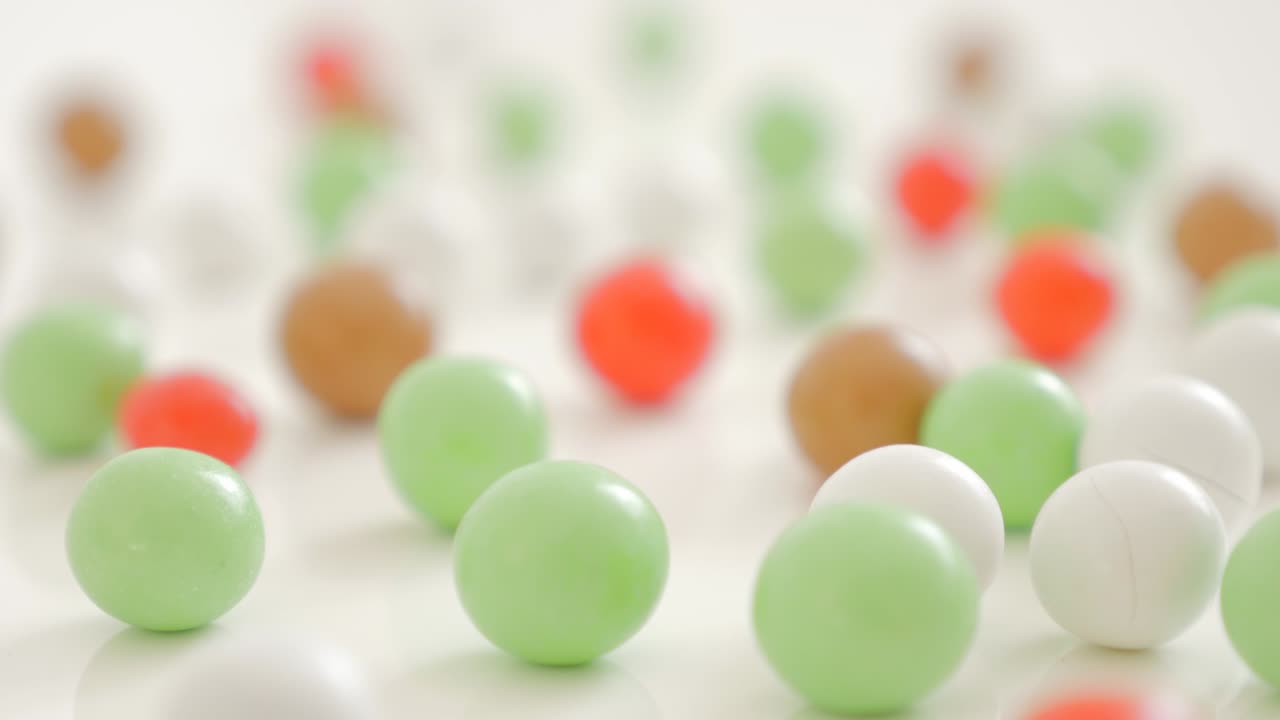 바탕에 둥근 다채로운 사탕, 느린 기울기 4k