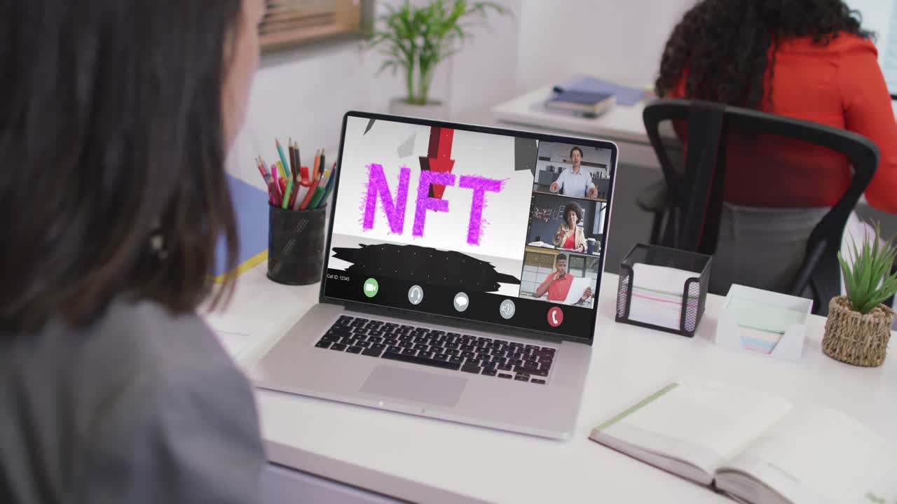 Caucasian businesswoman using laptop for video call with diverse business colleagues