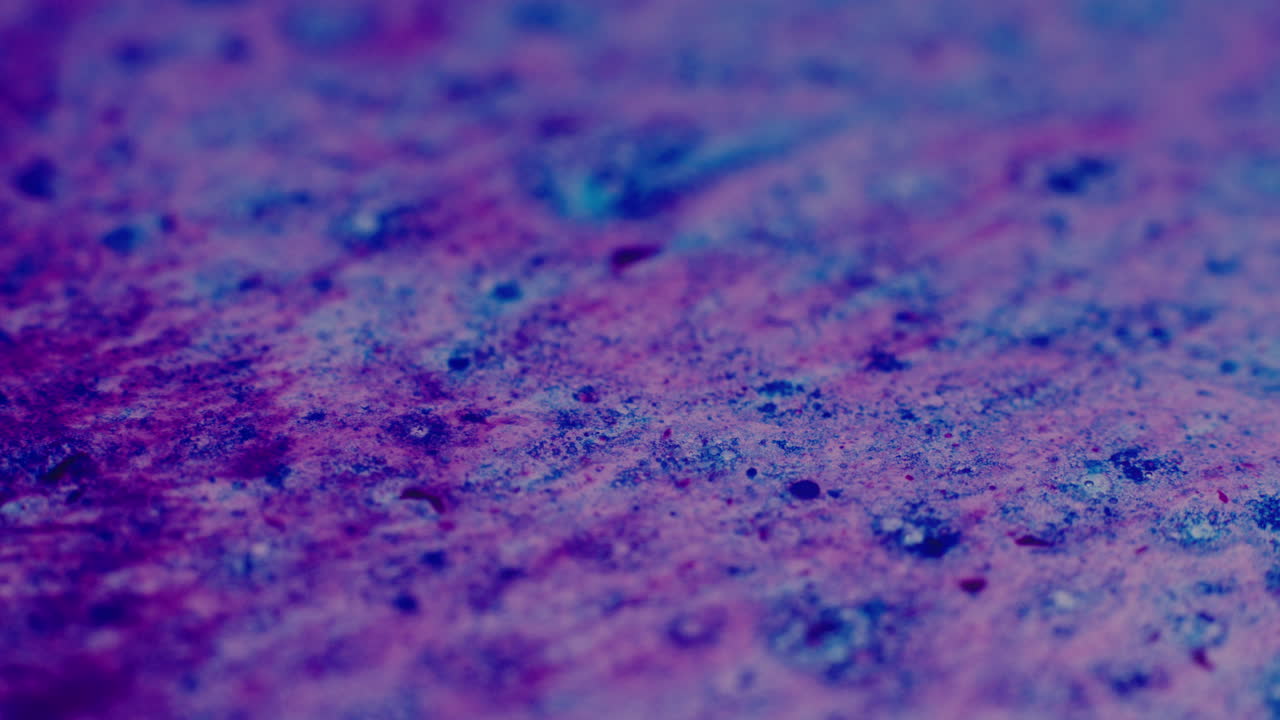 Colourful, organic, liquids macro shots buzzing and flowing