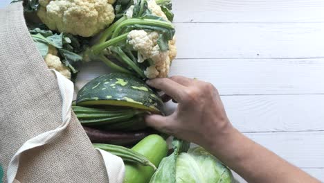 fresh vegetables in a reusable bag