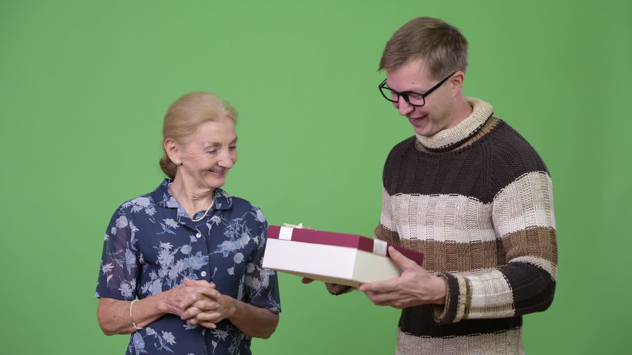 Grandson getting gift from grandmother with nothing inside