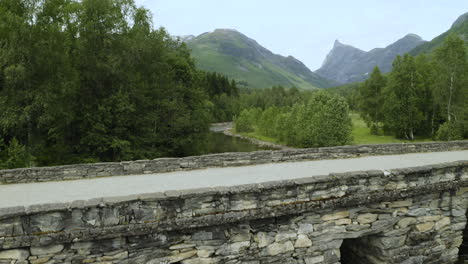 Bridge-Over-Flowing-Waters-Of-Gudbrandsjuvet-In-Andalsnes,-Norway