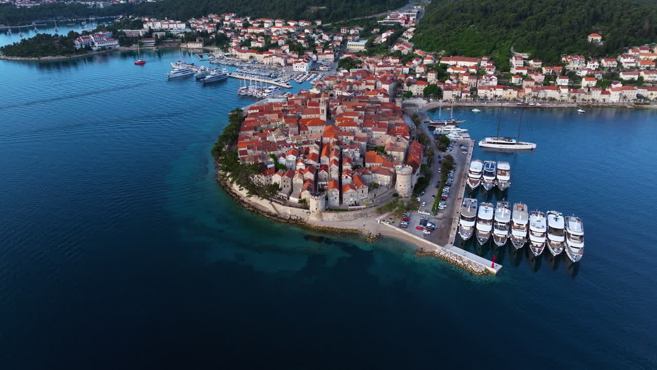Korcula Port, Old Town And Marina By The Adriatic Sea In Croatia. - aerial shot