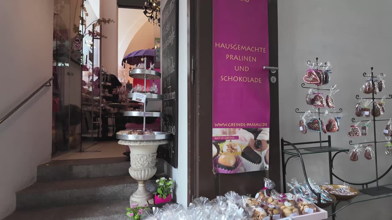 Production, cafe, restaurant with sweets, chocolate in old town Passau, Germany. Tourist attraction and delicious stop.