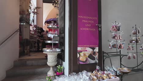 production, cafe, restaurant with sweets, chocolate in old town passau, germany. tourist attraction and delicious stop.