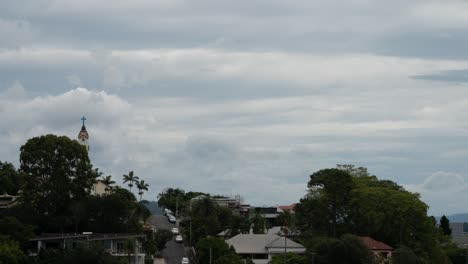 Time-lapse of clouds behind a church
