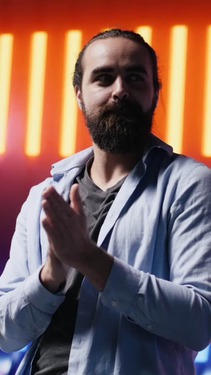 Vertical Video Stylish young man reflects artistic vibes by using virtual reality headset