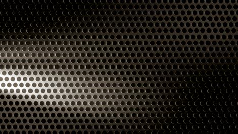 perforated black sheet metal with volumetric light video