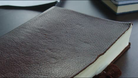 person flipping through book or journal close up slow motion shot