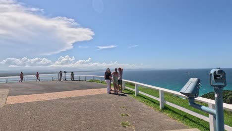 visitors enjoying a panoramic ocean overlook