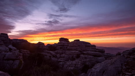 sunrise with clouds at sandwich rocks in spain