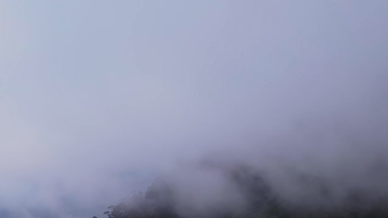 Stunning aerial view of Madeira's mountains shrouded in mist
