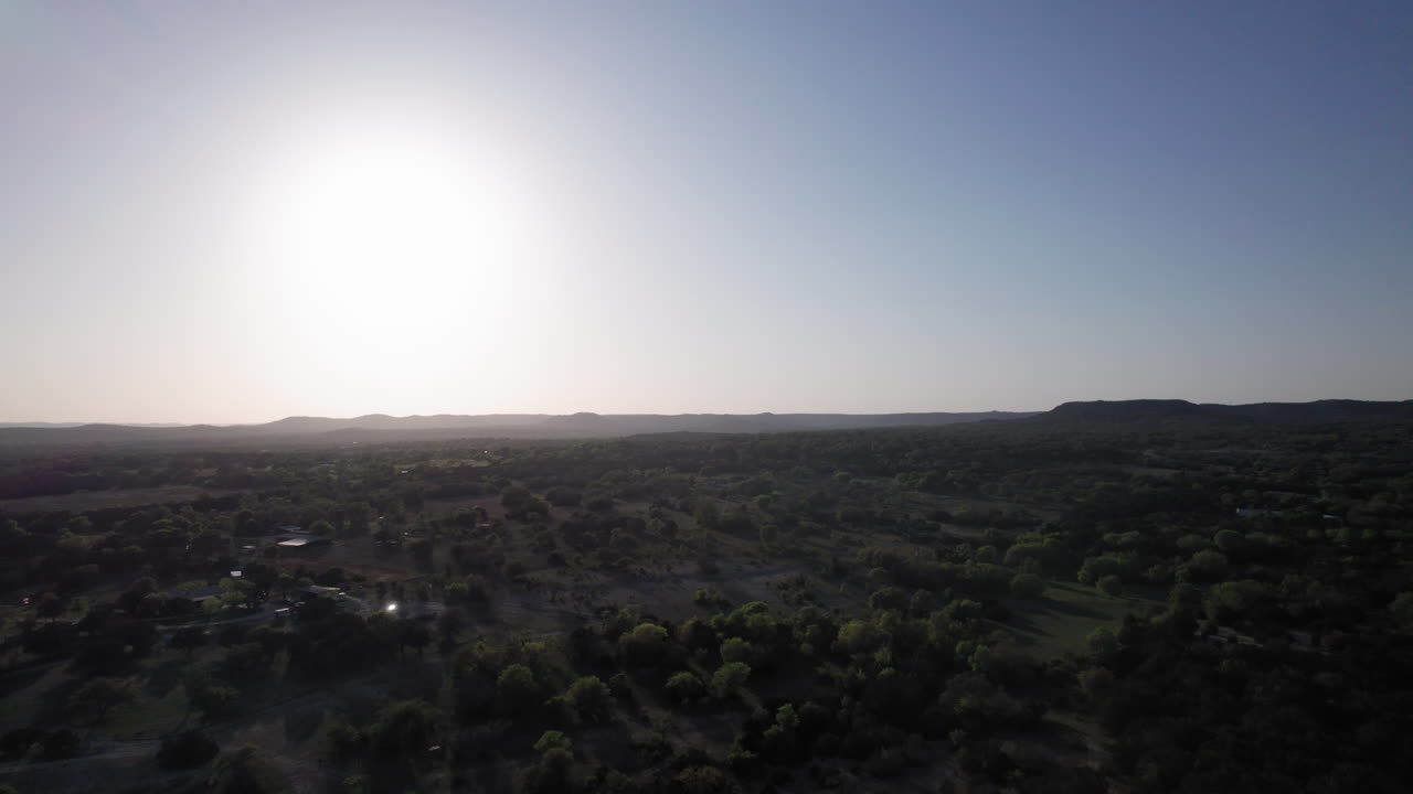 Aerial drone shot of the Texas Hill Country and ranch land near Bandera, Texas with distant mesas