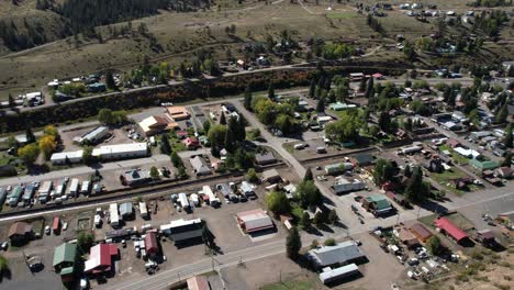 Aerial-View-of-Downtown-Creede,-Colorado-USA,-Former-Mining-Town-Buildings-and-Streets,-Drone-Shot