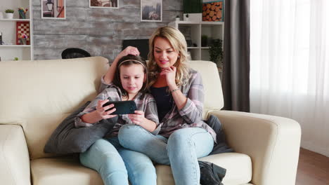 Zoom-in-shot-of-mother-and-her-daughter-with-braces