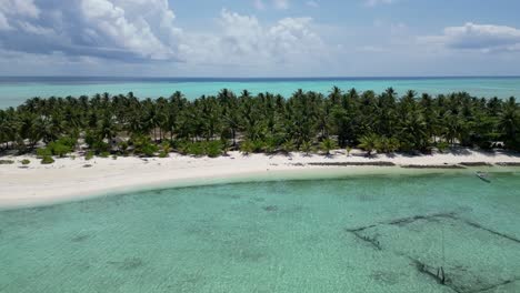 Aerial-dolly-over-Onok-island,-balabac-white-sandy-beach-and-tropical-palm-tree-jungle