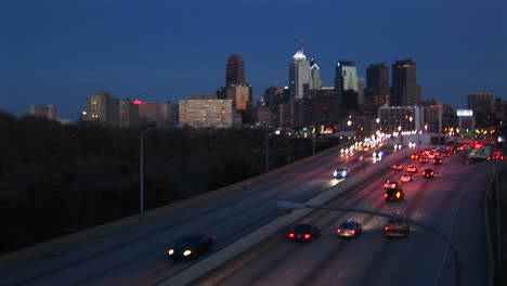 The-Camera-Looks-Down-On-Traffic-Entering-And-Leaving-Downtown-Chicago-At-Night